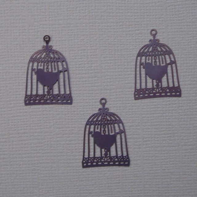 3 cages a oiseaux violet