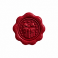 Petit cachet de cire de Noël motif paquet cadeau